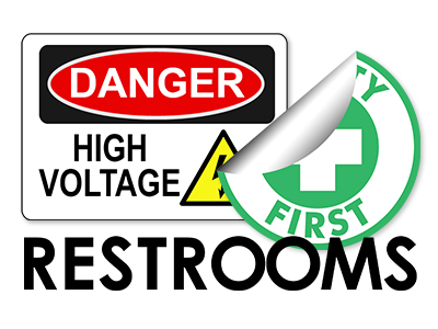 Calendered Vinyl with Lamination danger warning label for high voltage in a restroom. Warning label in red background with white Warning text with black text reading High Voltage. Also included a yellow triangle exclamation point image. Restroom text is in green on a white background.