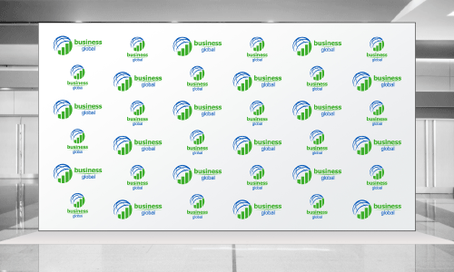 Step and repeat banners with repeating circular logos of half a blue sphere and a green bar graph underneath. The text next to the logo says Business in green text, and Global in blue text. There is a bare trade show scene in the background.